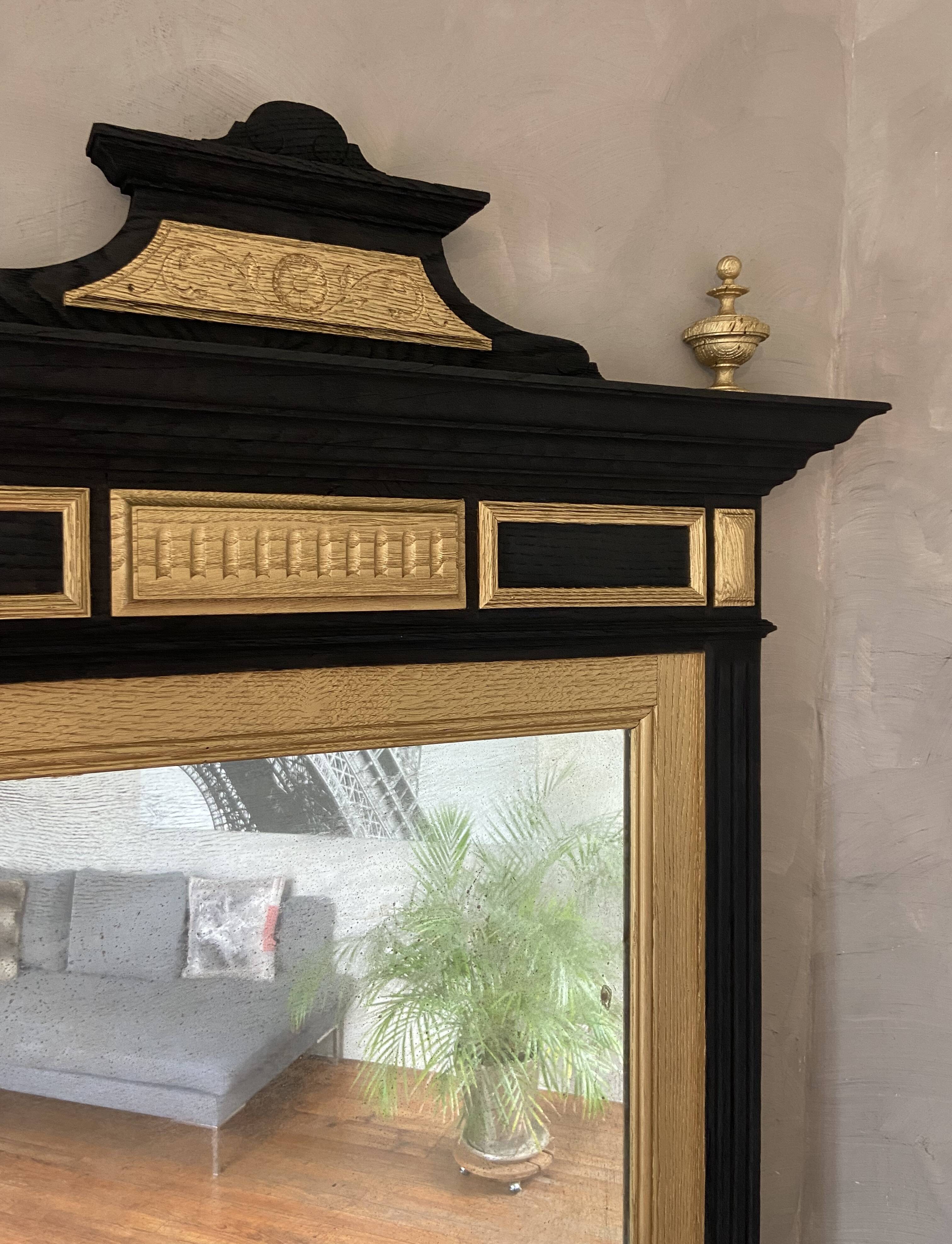 Large mirror in black and gold oak