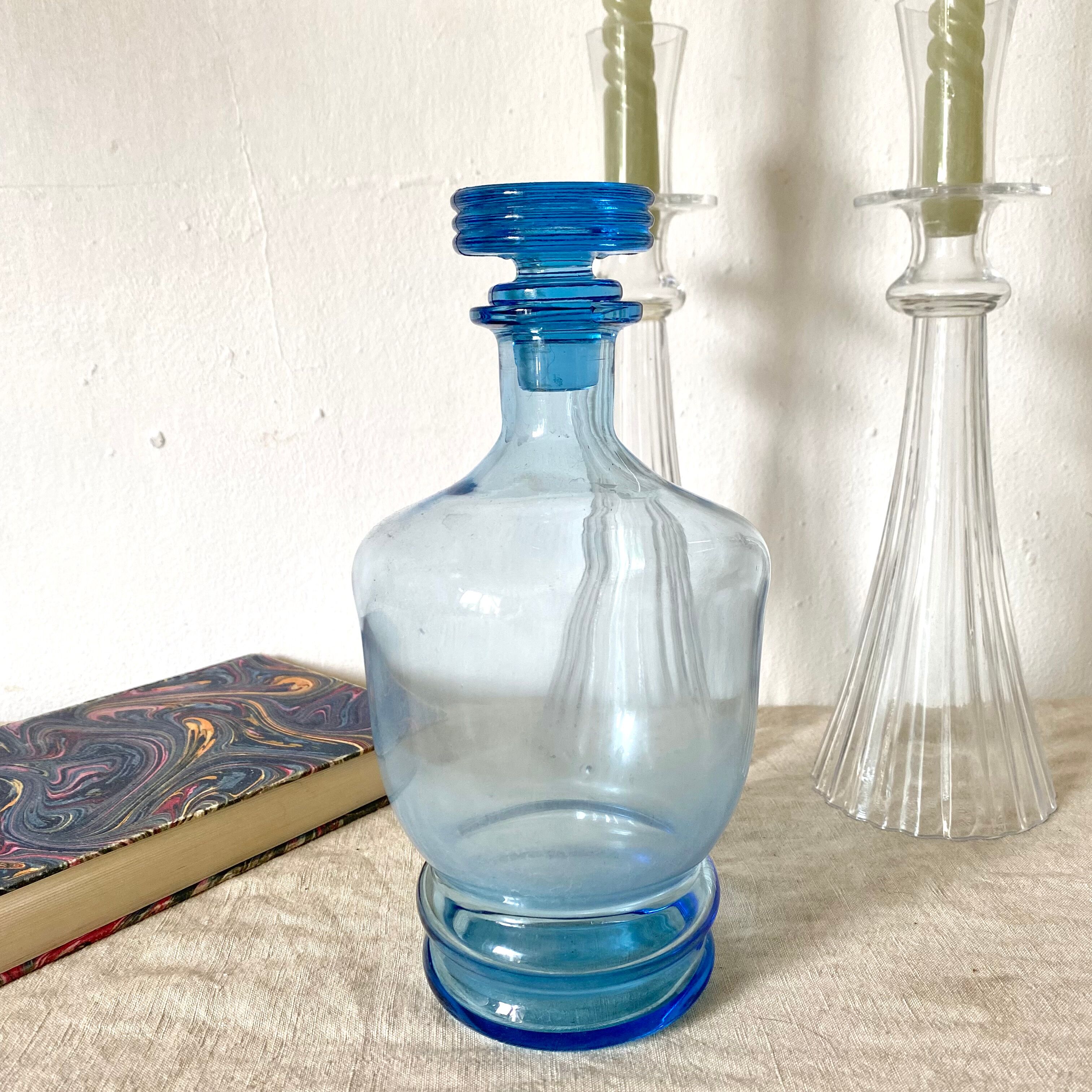 Antique carafe in blue glass