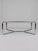 Chrome coffee table with a glass top.