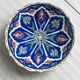 Decorative plate in glazed ceramic