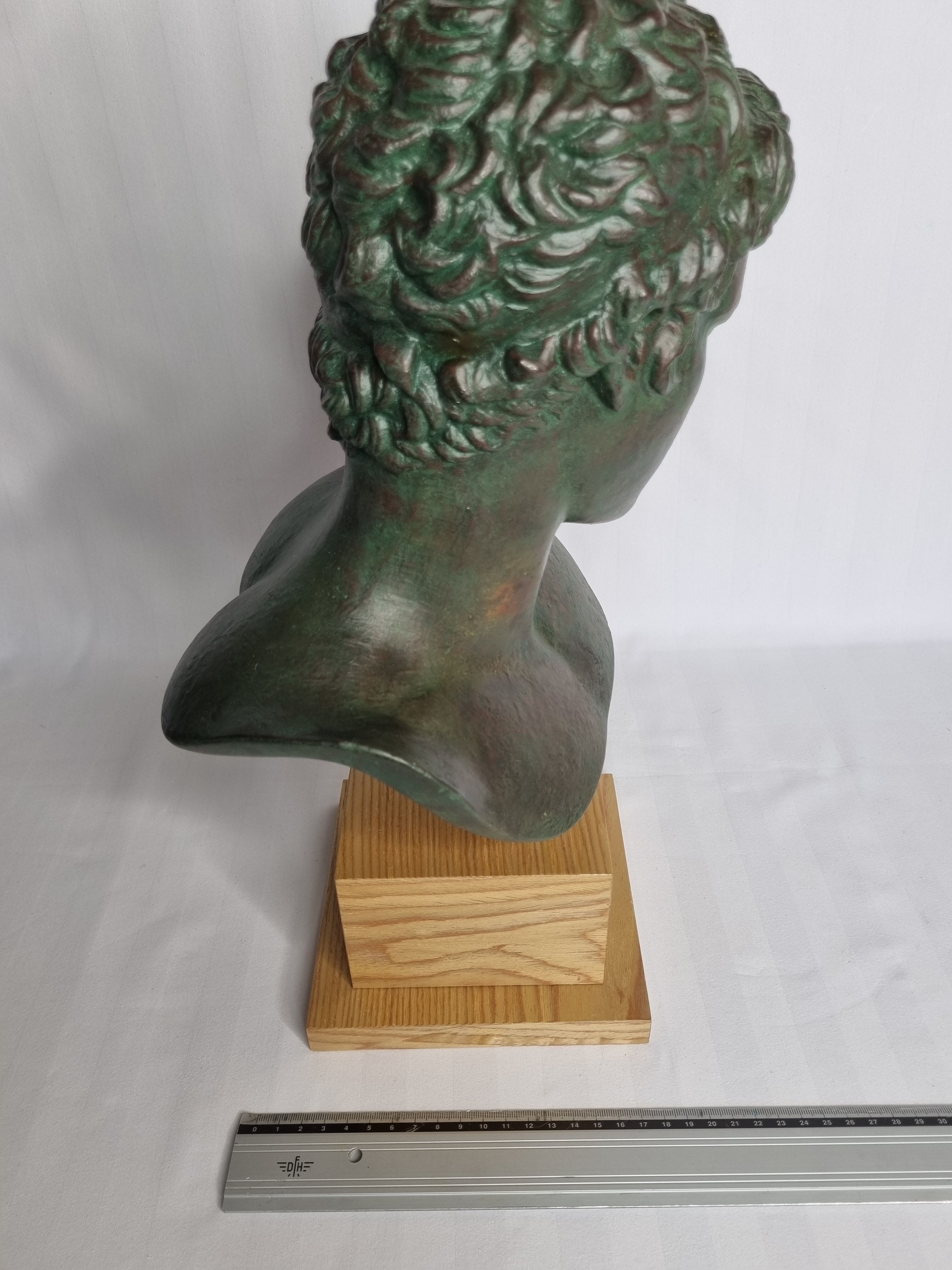 Bust of the Ephebus of Marathon in patinated plaster on base