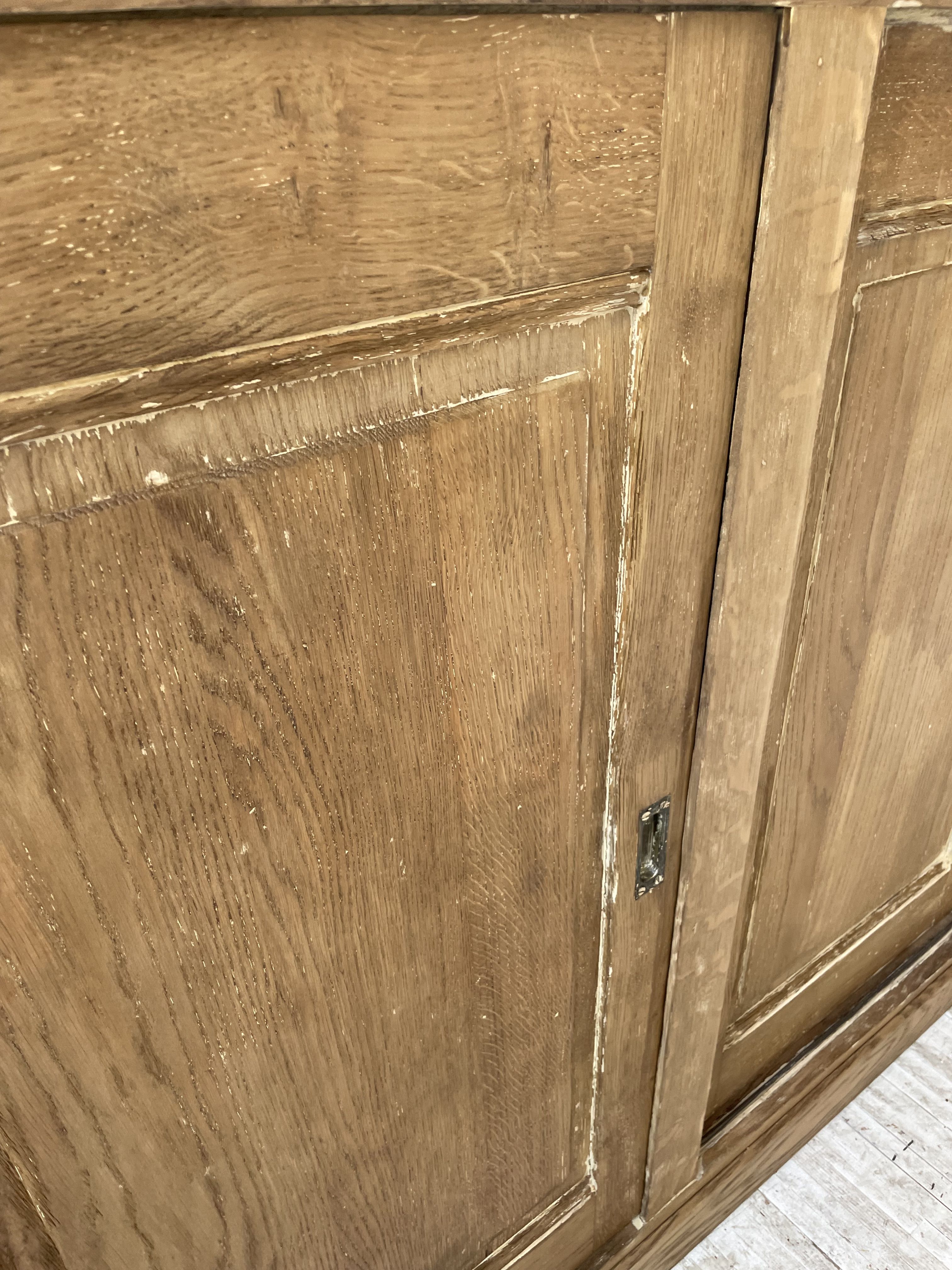 Large row of solid oak loom sliding doors