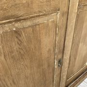 Large row of solid oak loom sliding doors
