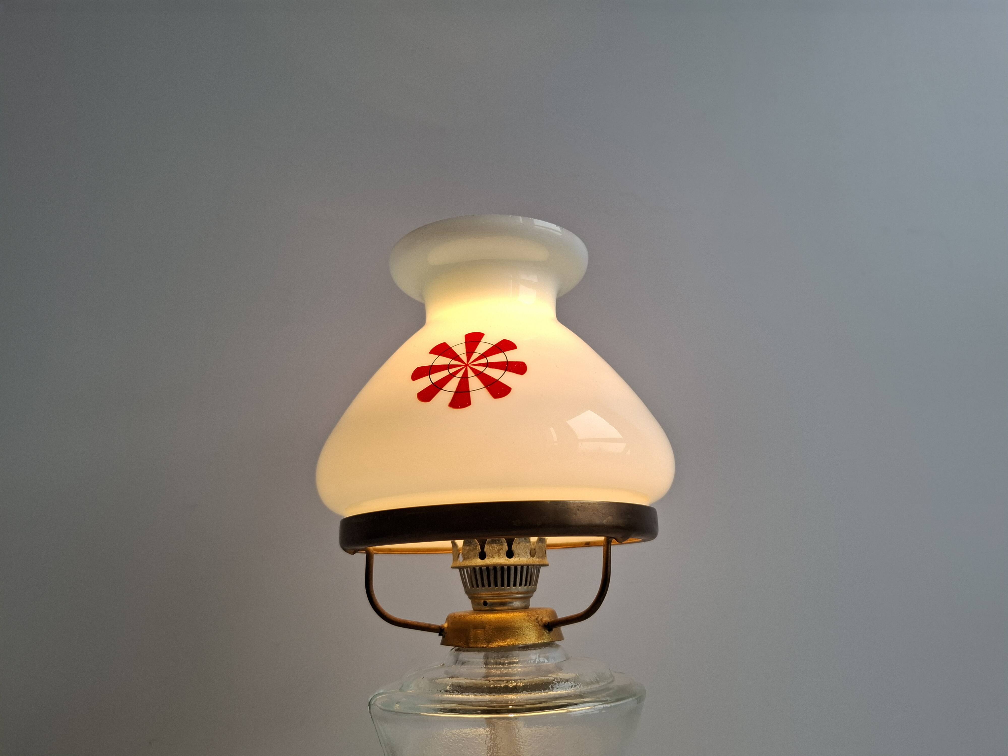 1960s Czechoslovakian milk glass oil lamp style table lamp with red windmill