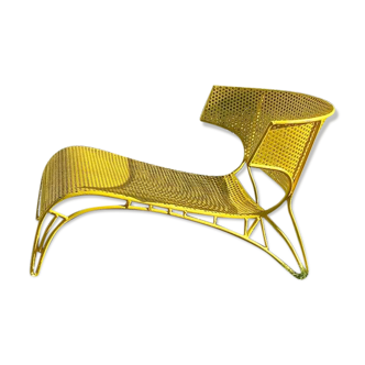 Perforated sheet metal armchair