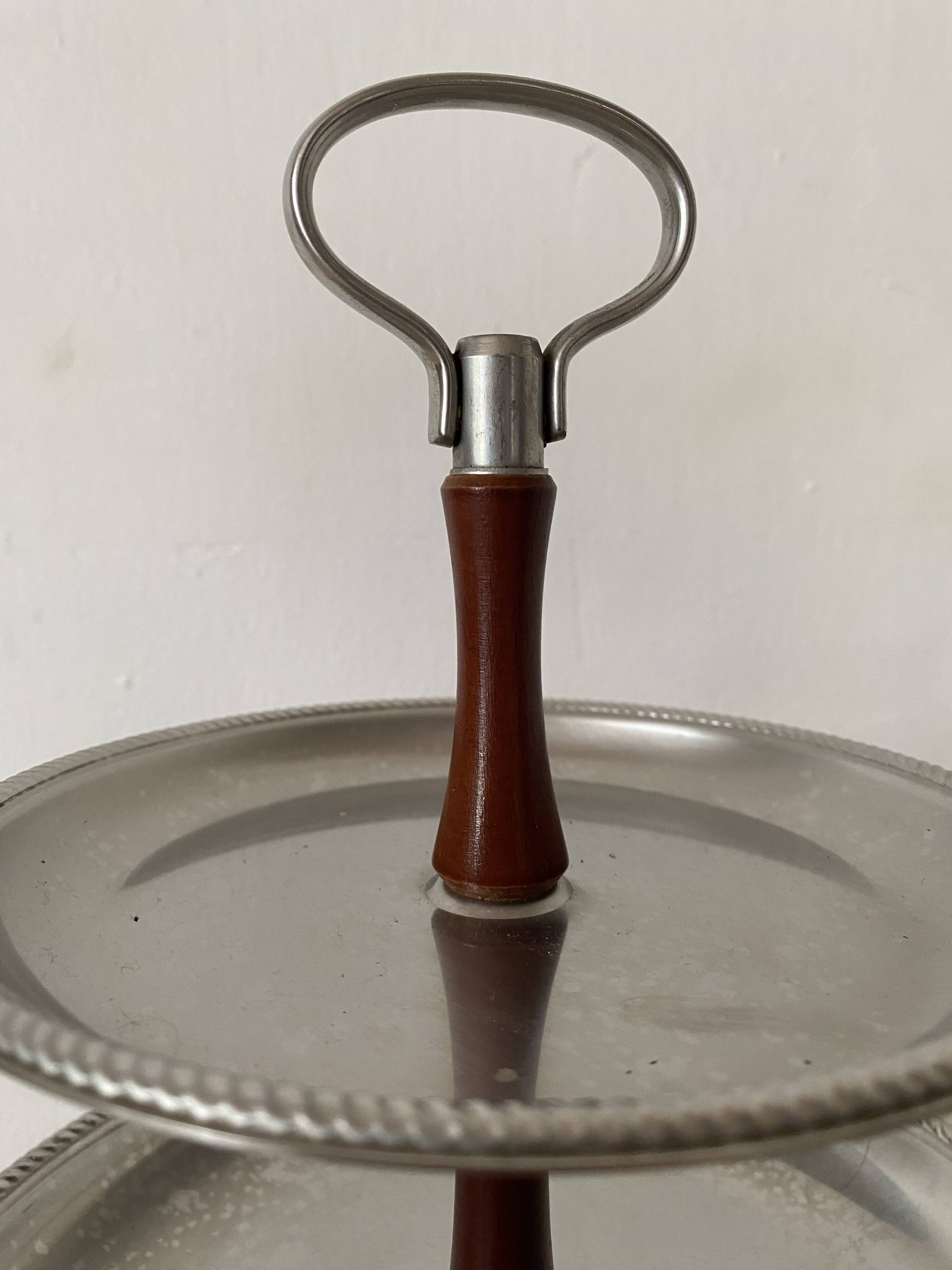Vintage tiered display stand, stainless steel rotating server Alessi Fratelli