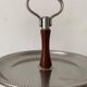 Vintage tiered display stand, stainless steel rotating server Alessi Fratelli
