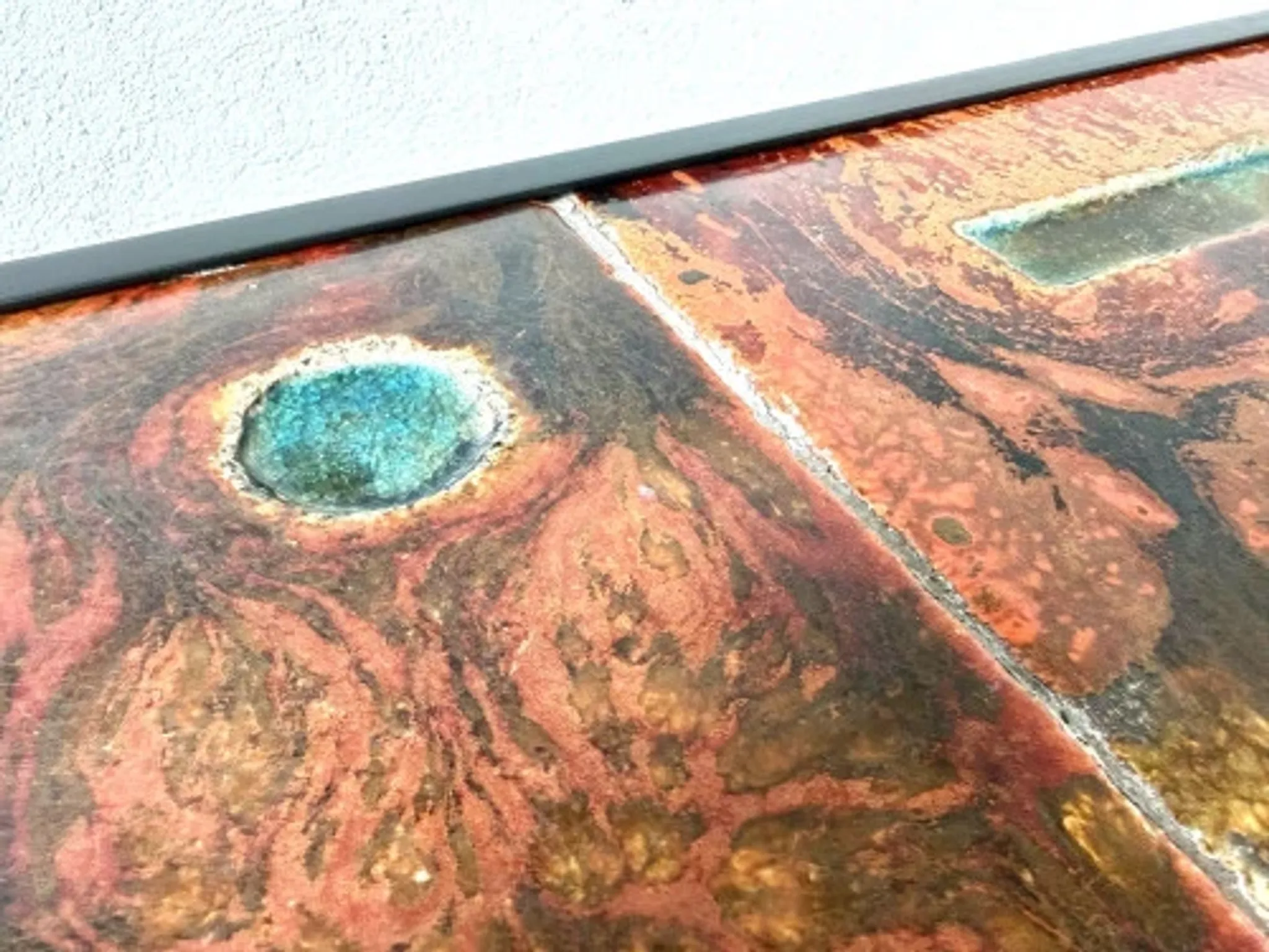 Coffee table by Robert and Jean Cloutier in enamelled lava and metal, 1950s.