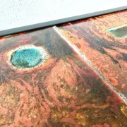 Coffee table by Robert and Jean Cloutier in enamelled lava and metal, 1950s.