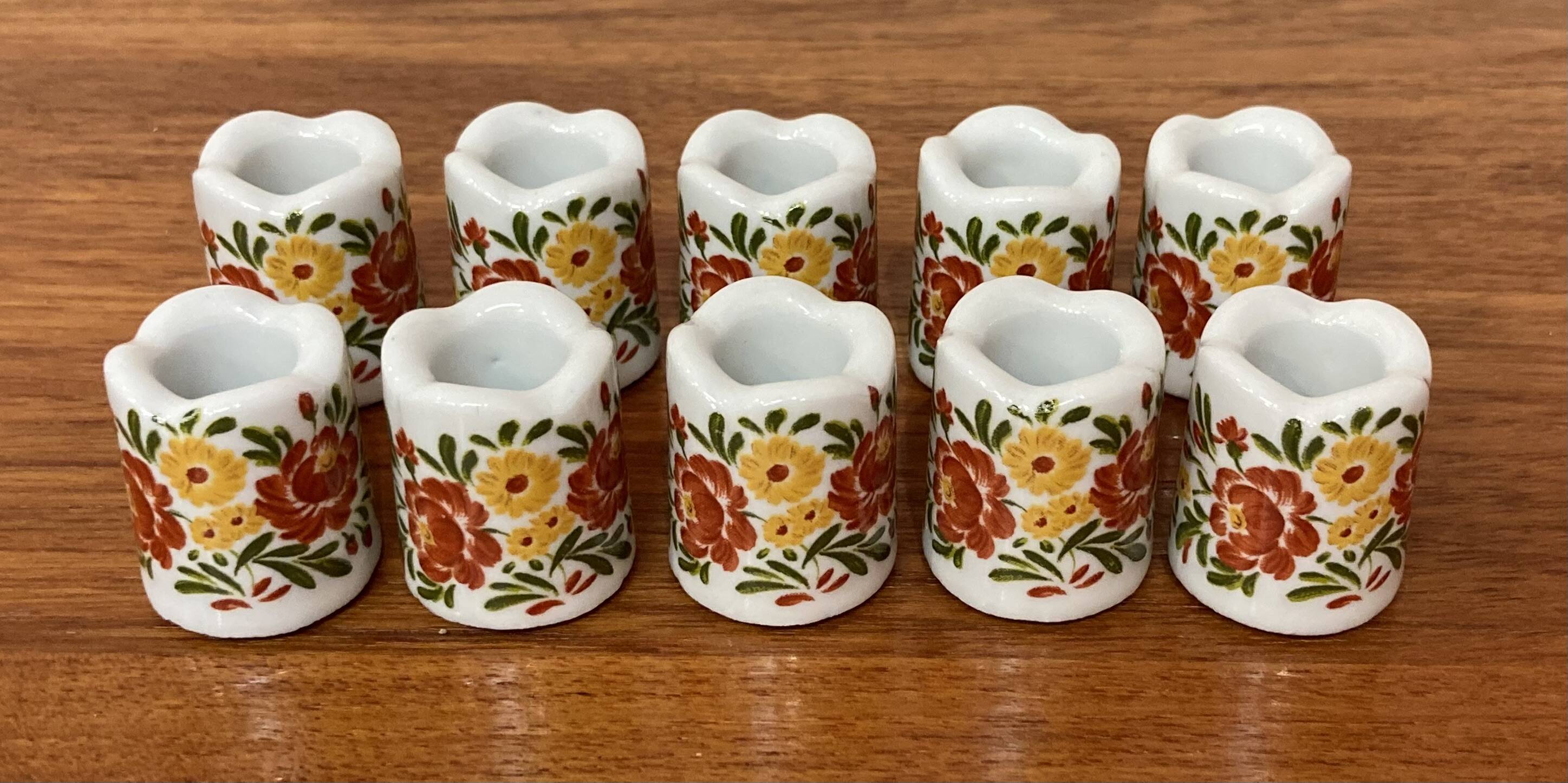 Set of ten 1950s design candle holders.