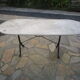 Old bistro table in marble and godin cast iron foot