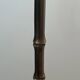 Bronze floor lamp in faux-bamboo style by Maison Baguès.