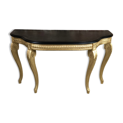 Console de style Louis XV en bois sculpté à dessus bois noir ciré