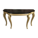 Console de style Louis XV en bois sculpté à dessus bois noir ciré