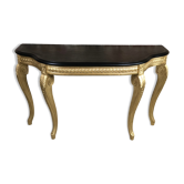 Console de style Louis XV en bois sculpté à dessus bois noir ciré