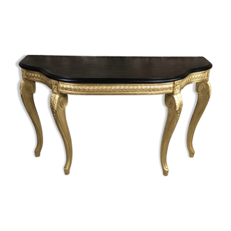 Console de style Louis XV en bois sculpté à dessus bois noir ciré