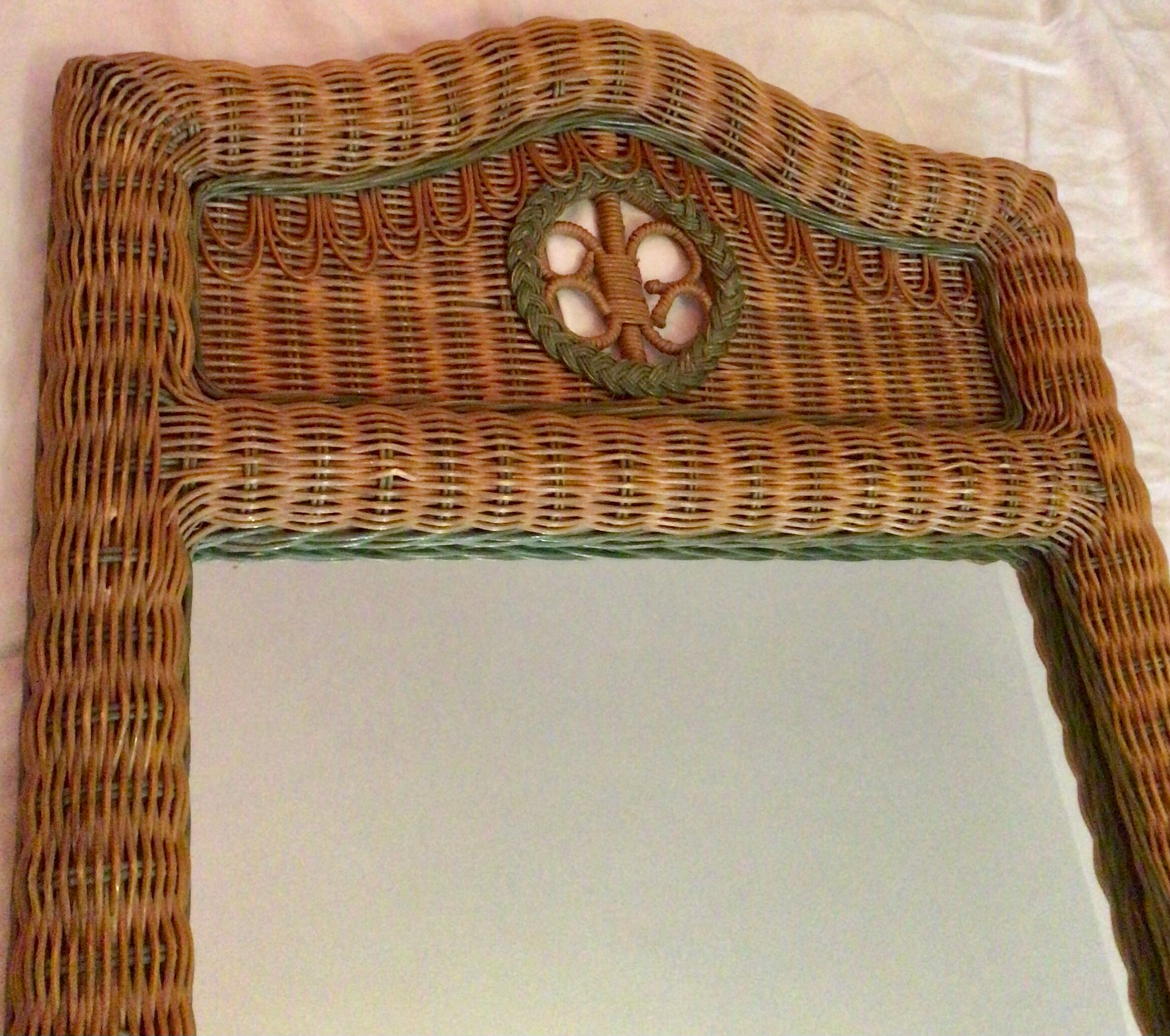 Vintage braided rattan mirror.