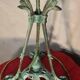 Antique patinated bronze regulator lamp with Tiffany glass shade in very good condition