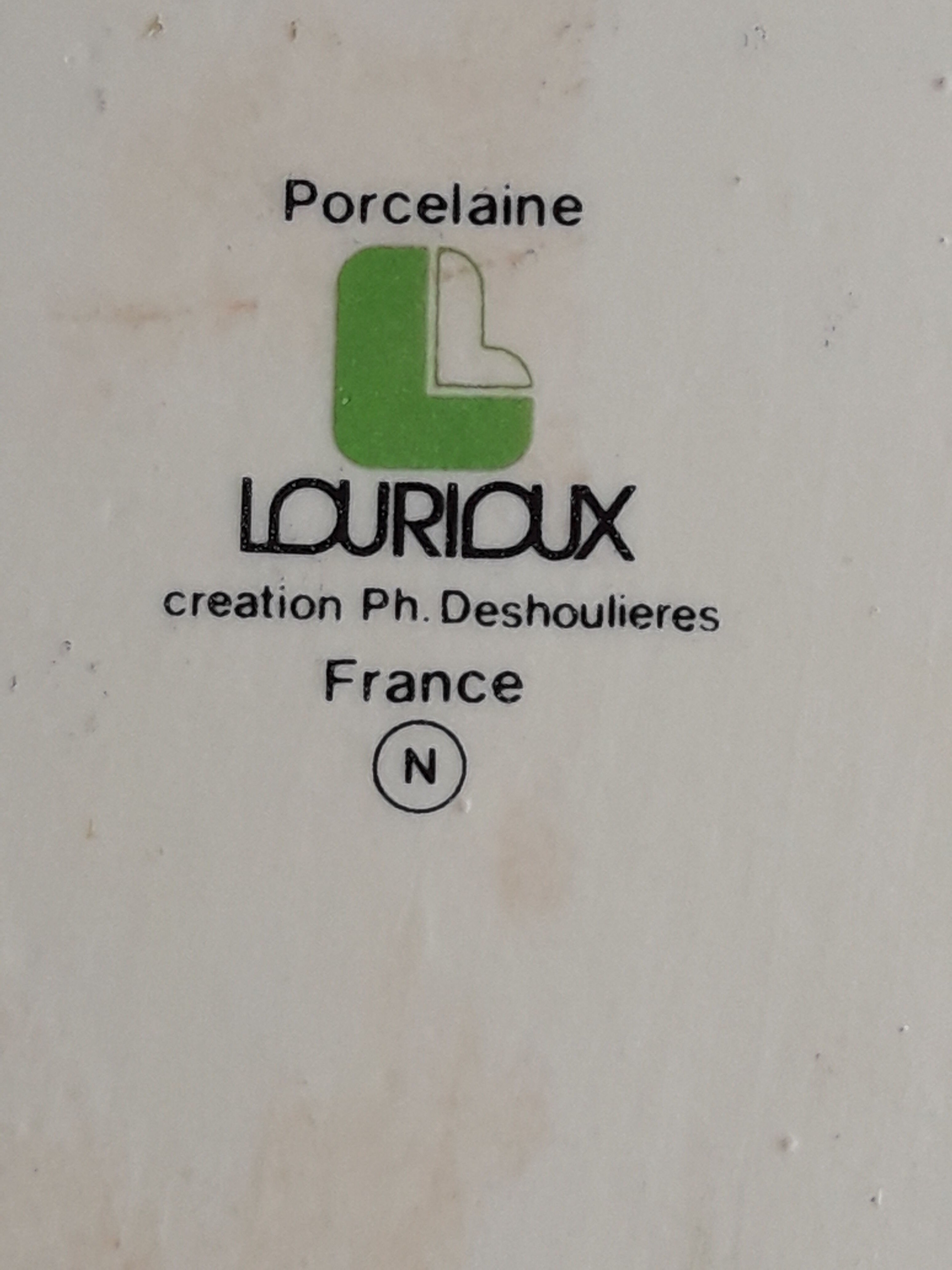 Lourioux porcelain raclette service created by Philippe Deshoulières