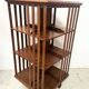 Rotating library in solid walnut, 20th century.