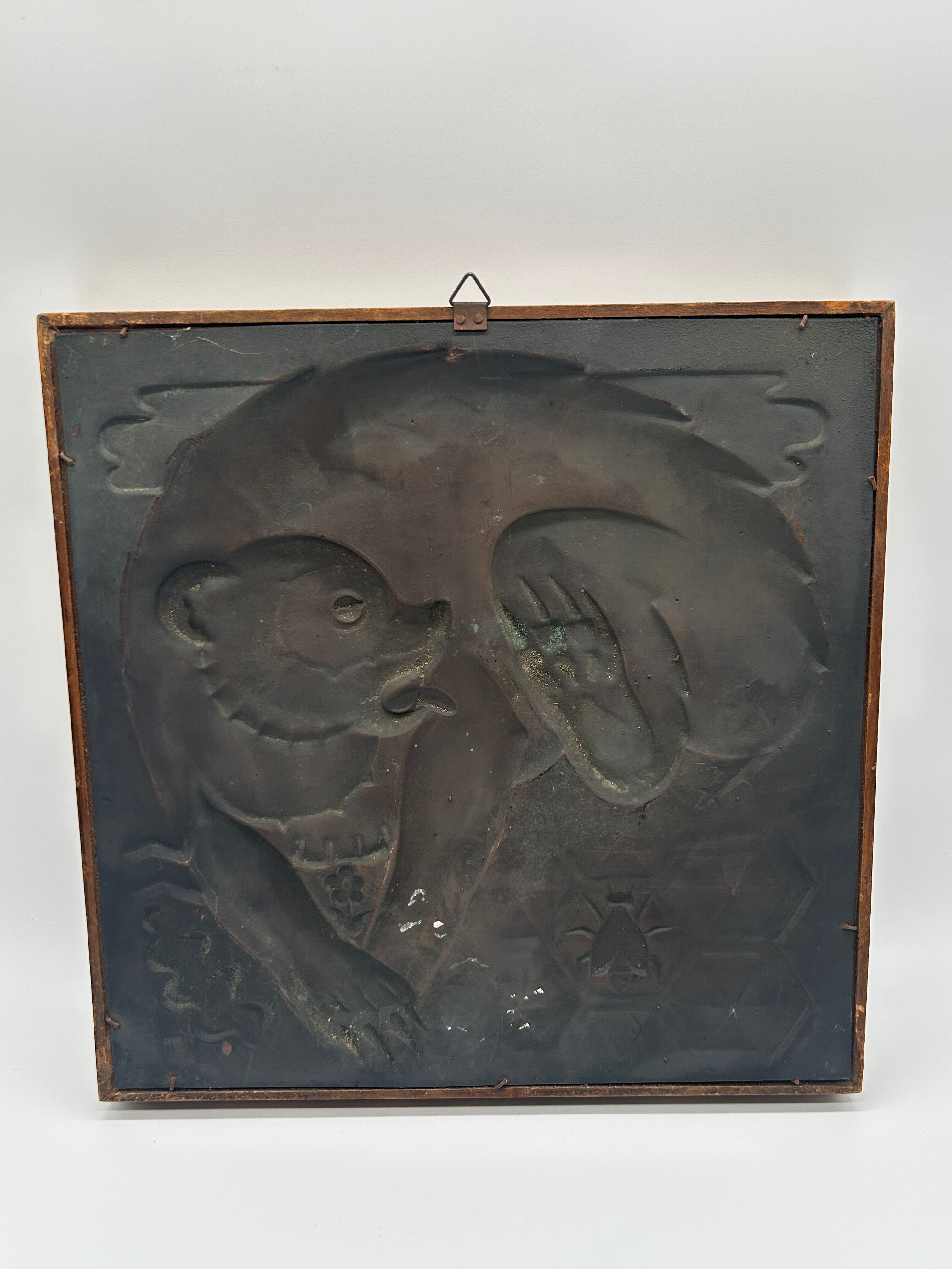 Art Deco bas-relief in Maredsous brasswork.