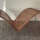 Magazine holder in woven rattan and metal