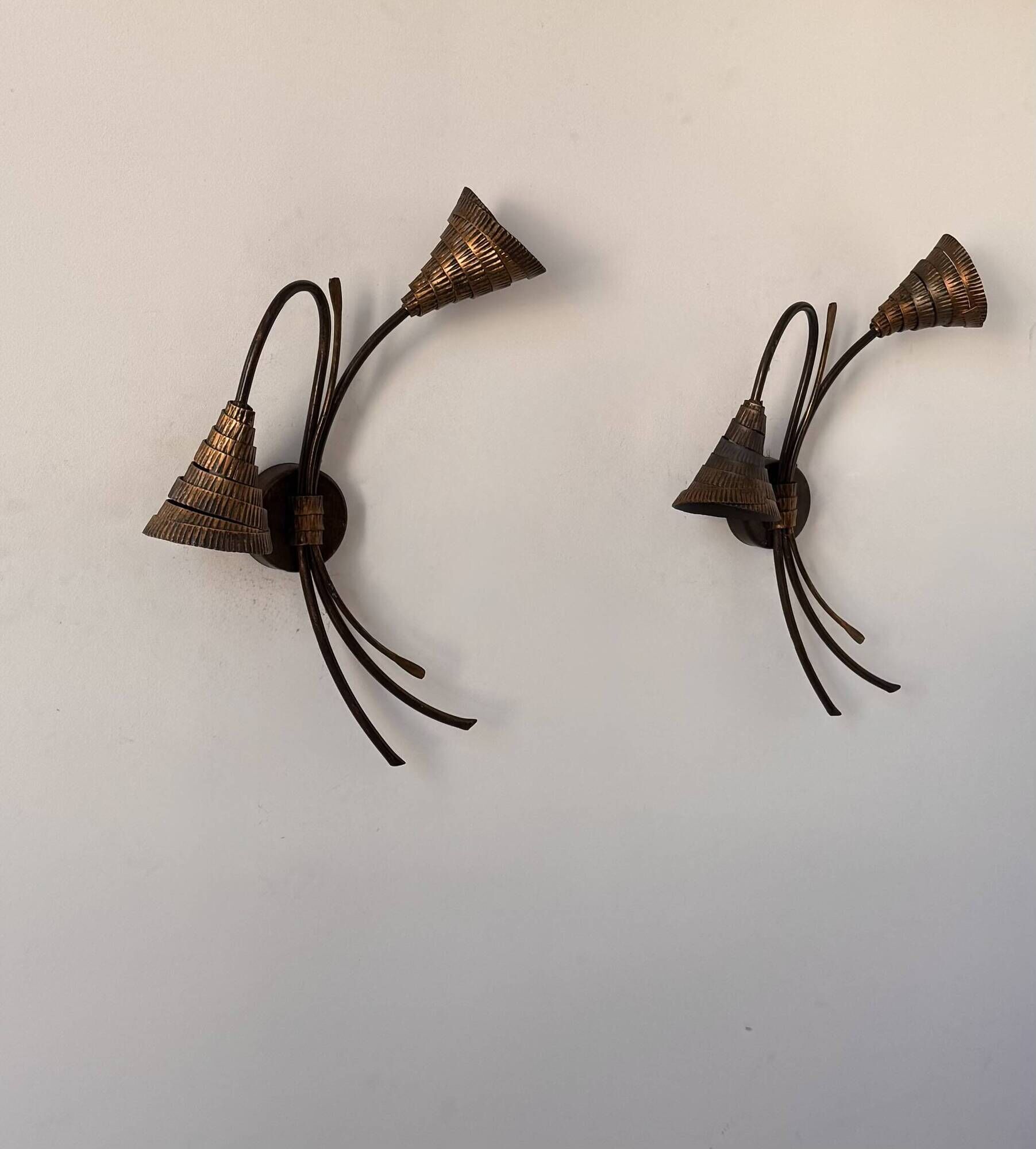 Vintage wall lights in gold metal and brass, France 1980.