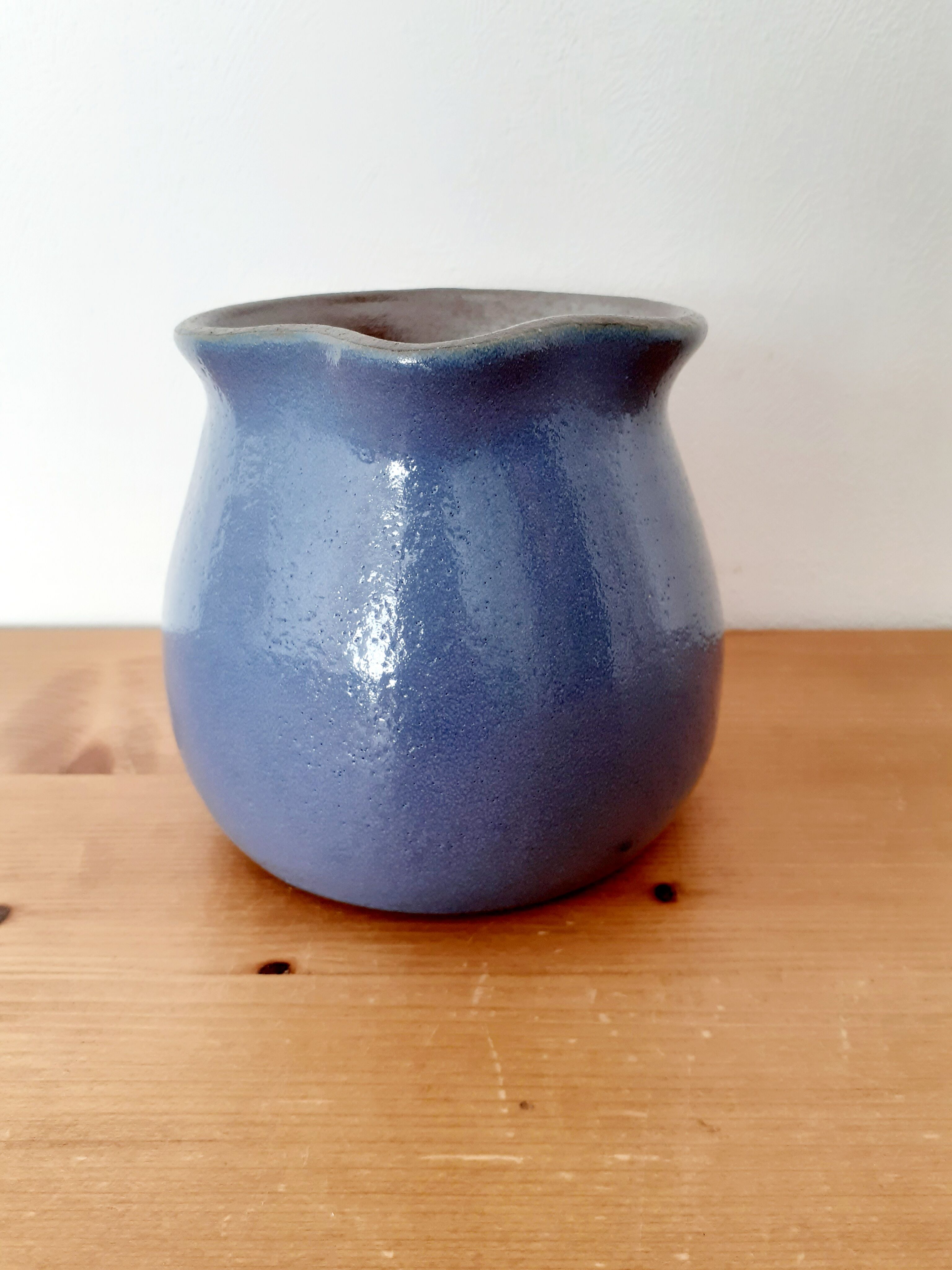Old glazed blue sandstone pitcher