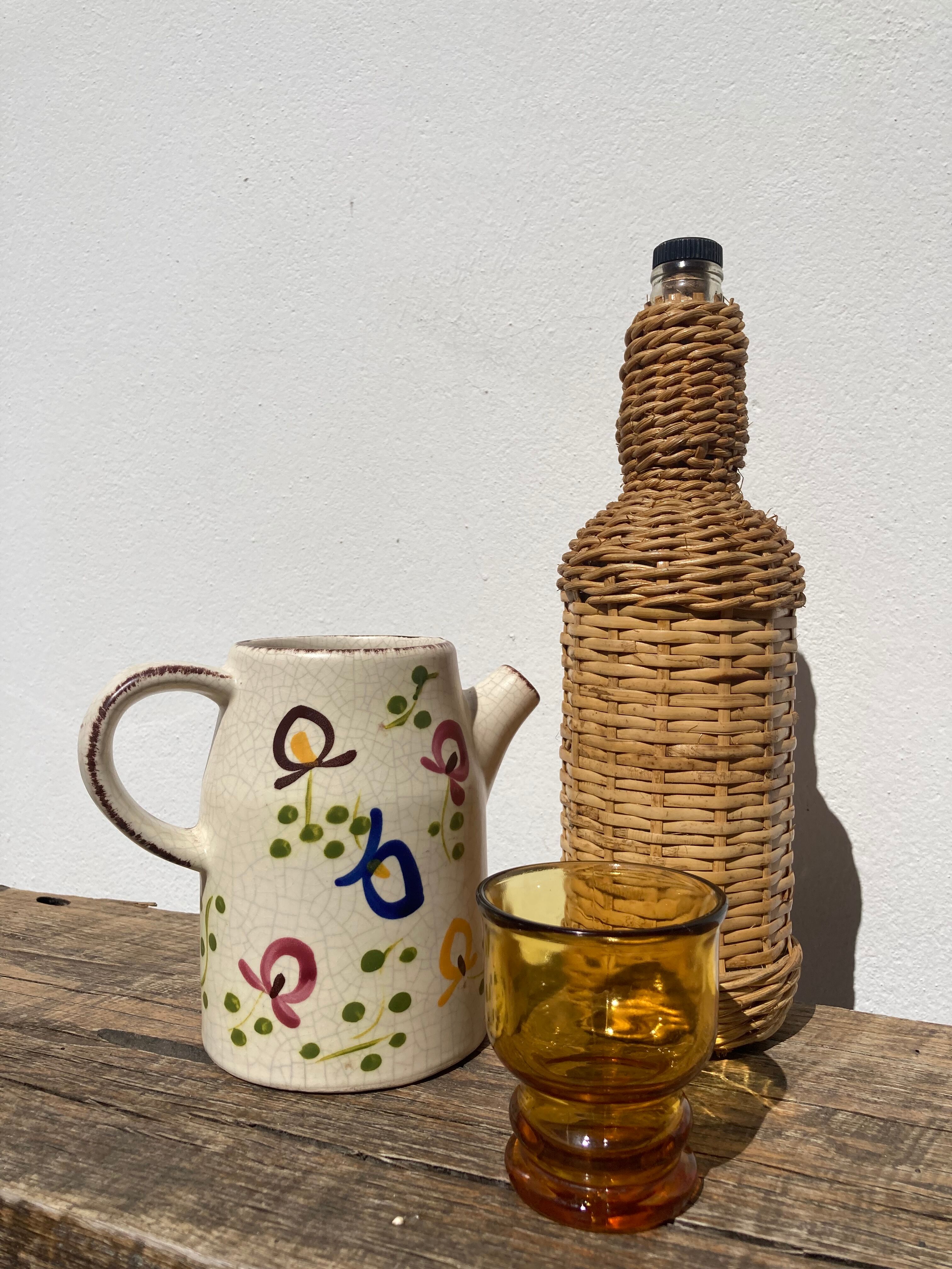 Ceramic water pitcher decorated with flowers