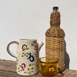 Ceramic water pitcher decorated with flowers