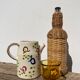 Ceramic water pitcher decorated with flowers