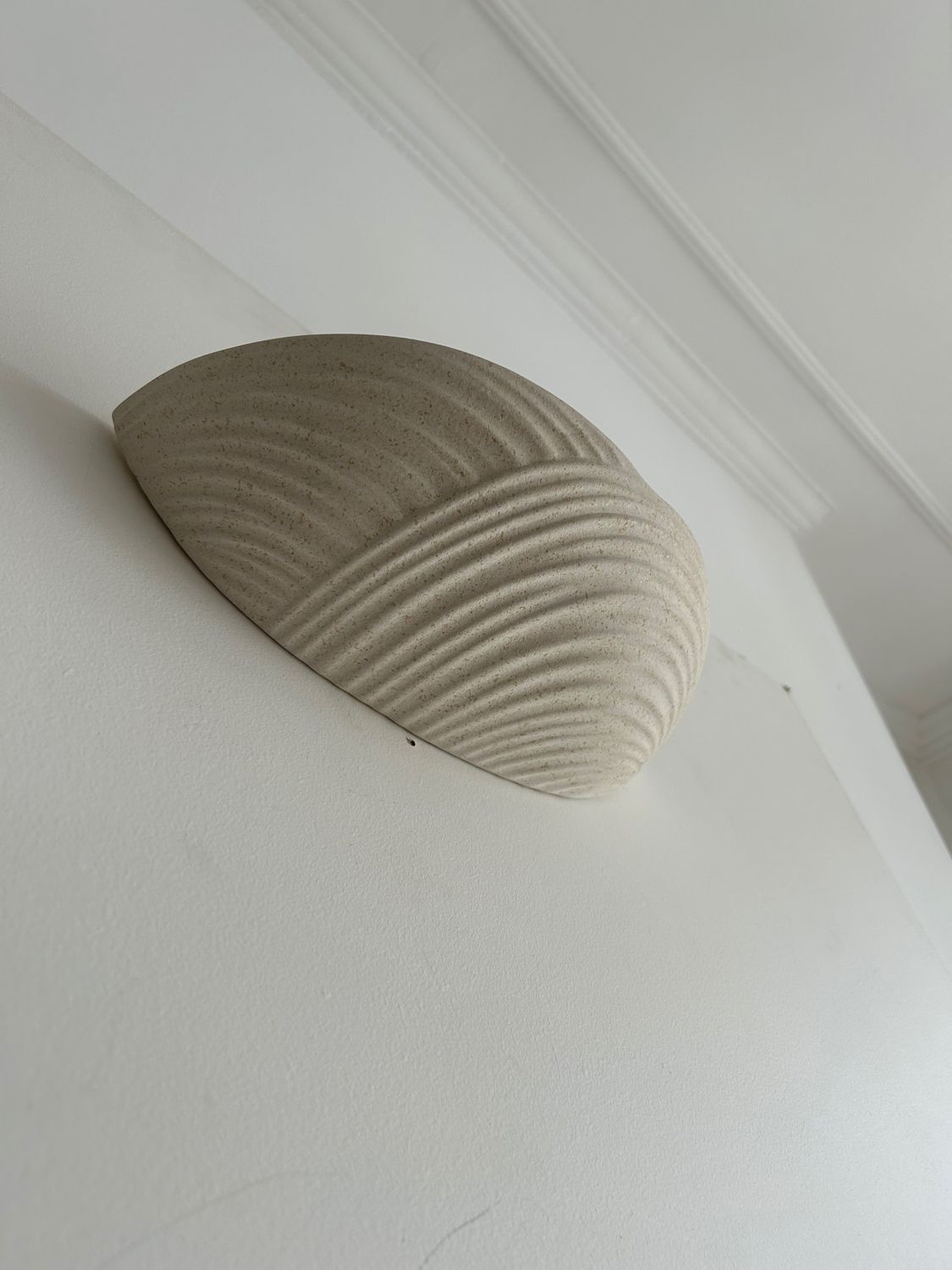 Pair of wall lamps in molded plaster France 1980