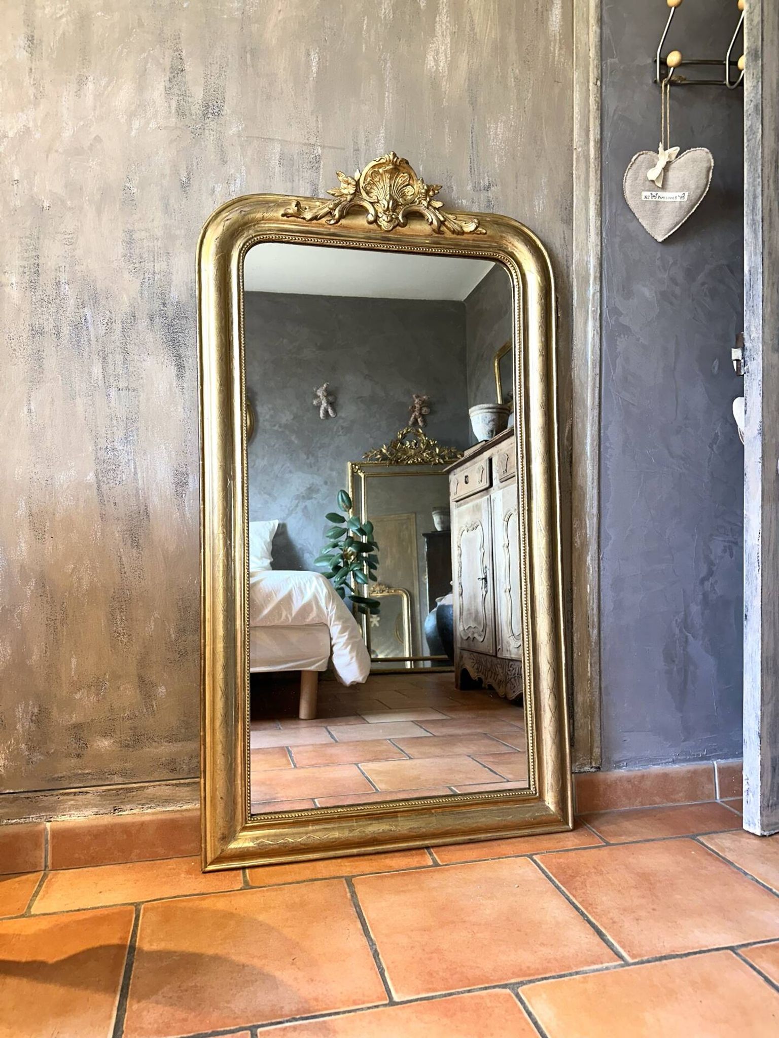 Antique Louis-Philippe gilded mirror from the late 19th century.