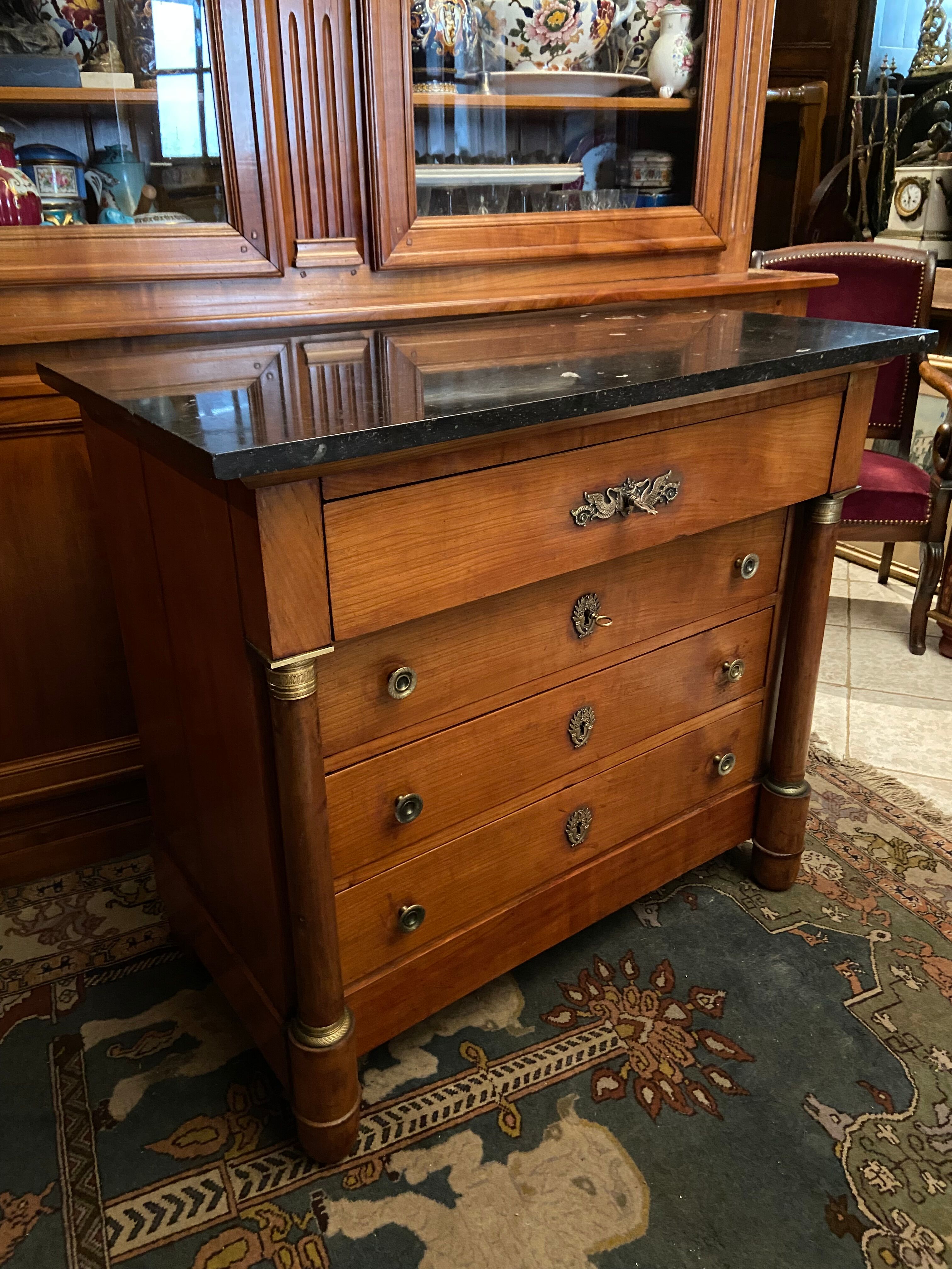 Chest of drawers with columns in blond walnut Empire style XIXth