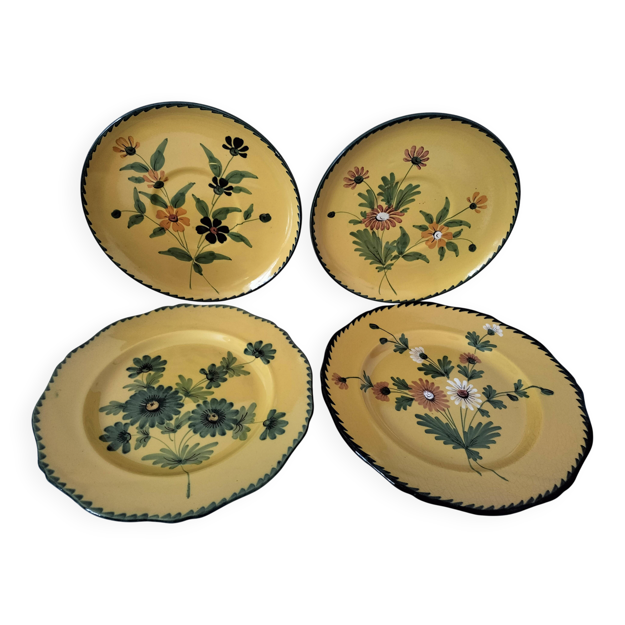 4 antique plates in hand-painted faience