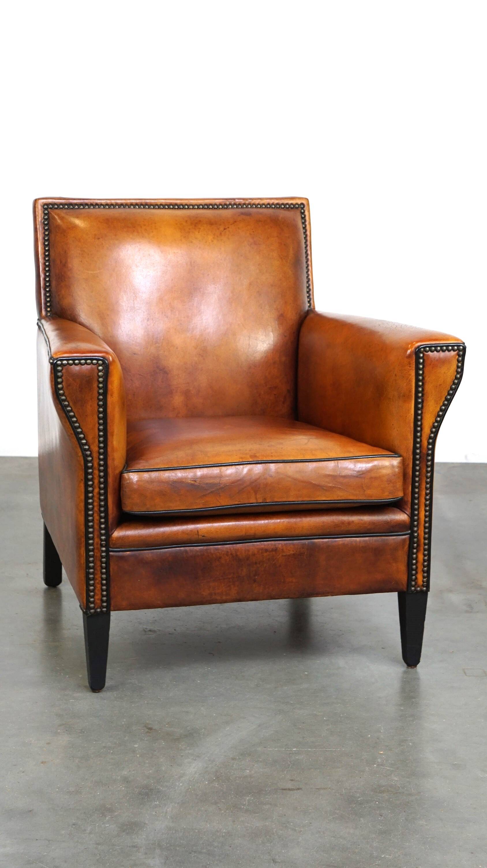 Sleek sheepskin Art Deco design armchair with beautiful details