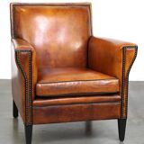 Sleek sheepskin Art Deco design armchair with beautiful details