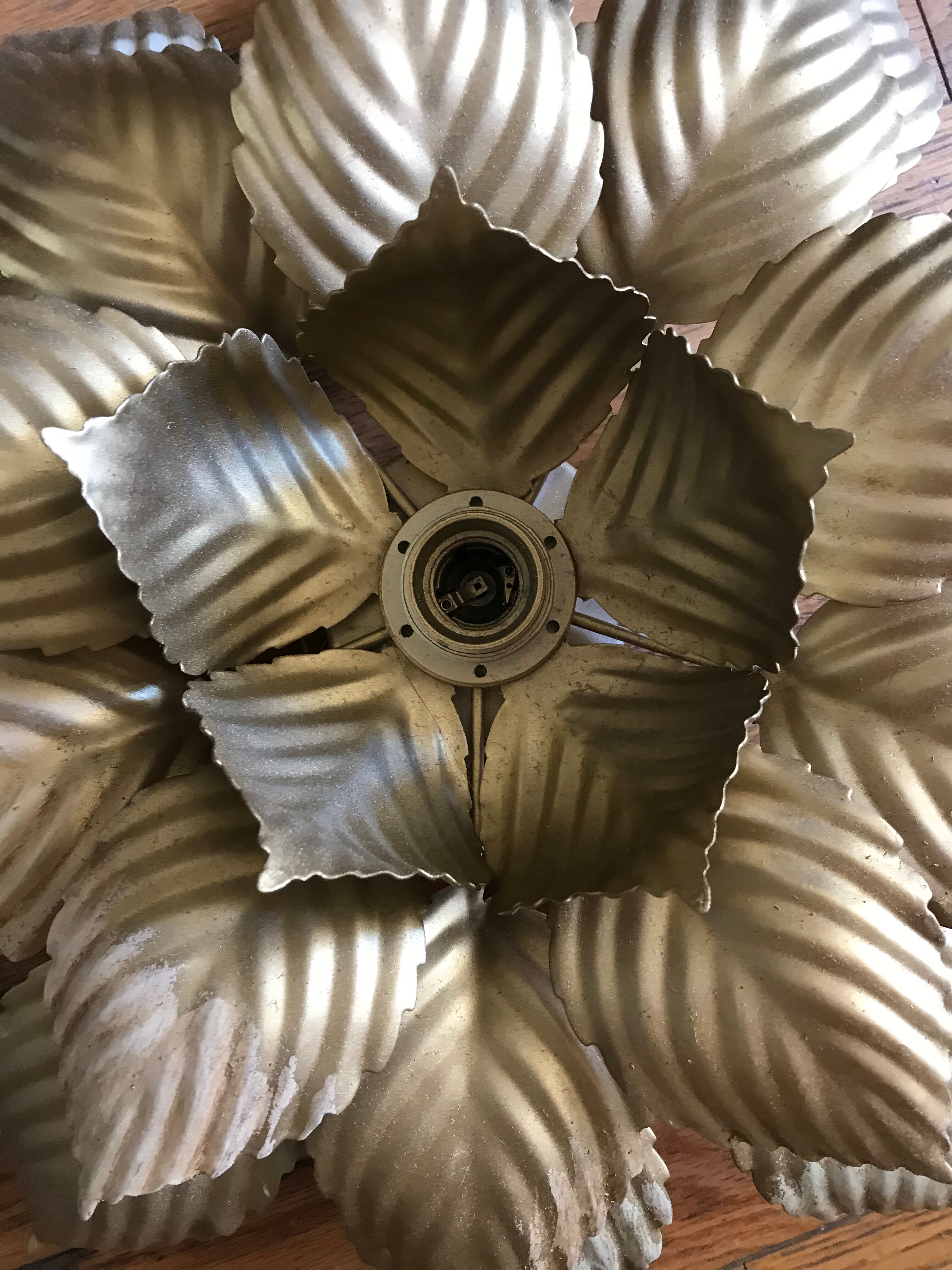 Apply gold metal flower