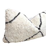 Bohemian wool pillow cover on a Beni Ourain Berber cushion. The cushion cover
