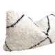 Bohemian wool pillow cover on a Beni Ourain Berber cushion. The cushion cover