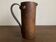 Mountain pitcher in monoxile wood and leather folk art