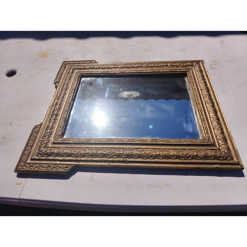Miroir en bois et stuc doré