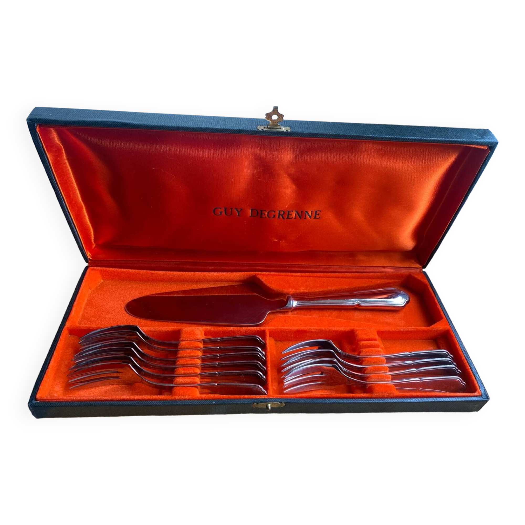 Ménagère à dessert pelle et 10 fourchettes guy Degrenne