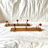 Pair of vintage wooden wall coat racks with three red ball hooks