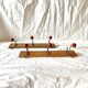 Pair of vintage wooden wall coat racks with three red ball hooks