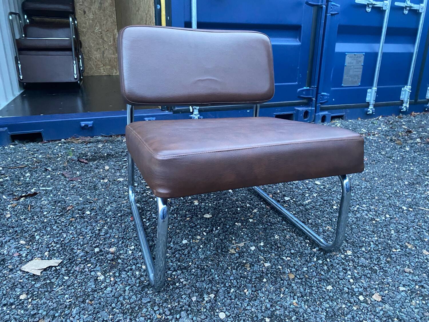Vintage low cantilever armchair – Brown faux leather & tubular frame