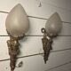 Pair of torch wall lights in Louis XVI style in 19th-century bronze.