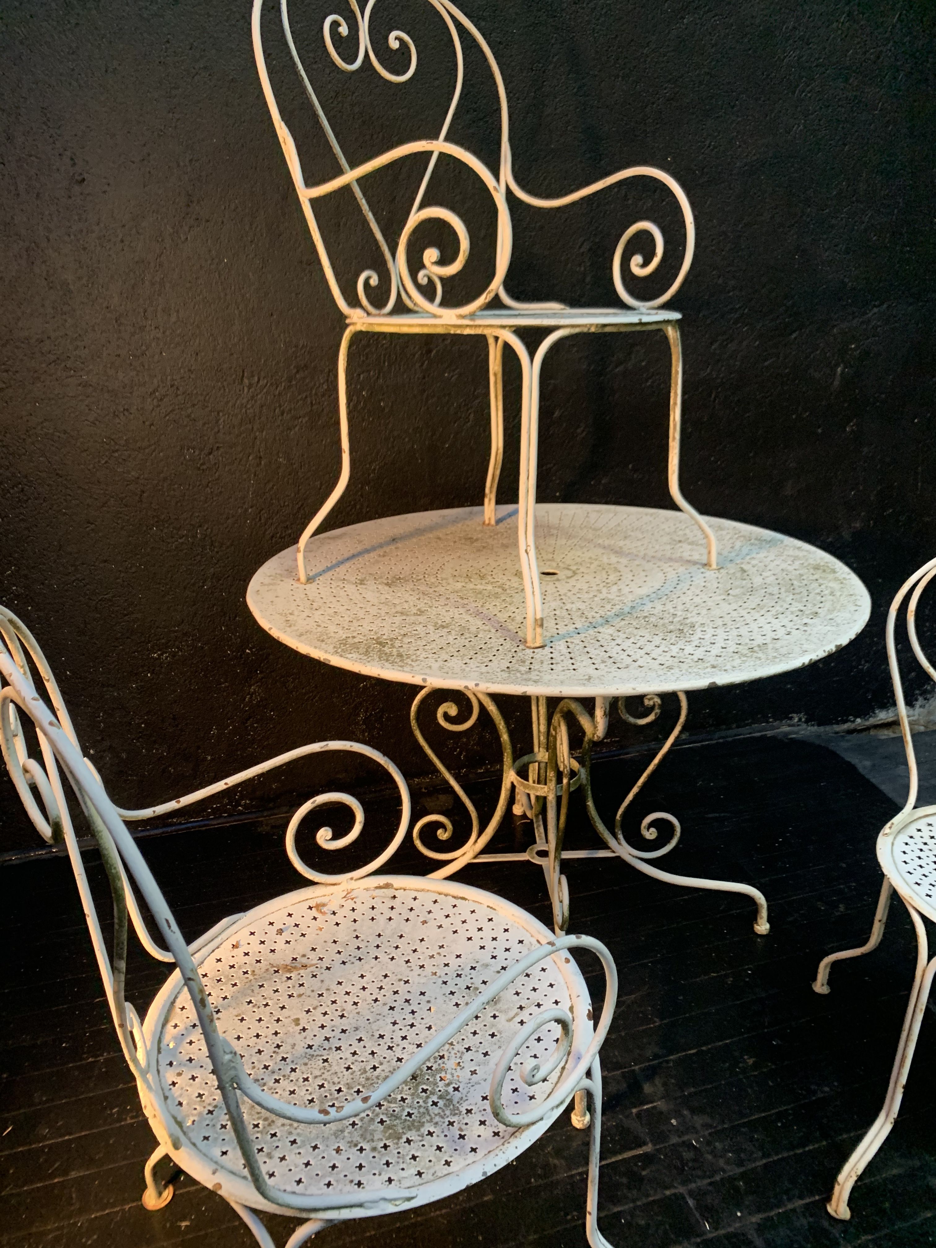 Set of wrought iron garden furniture