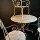 Set of wrought iron garden furniture