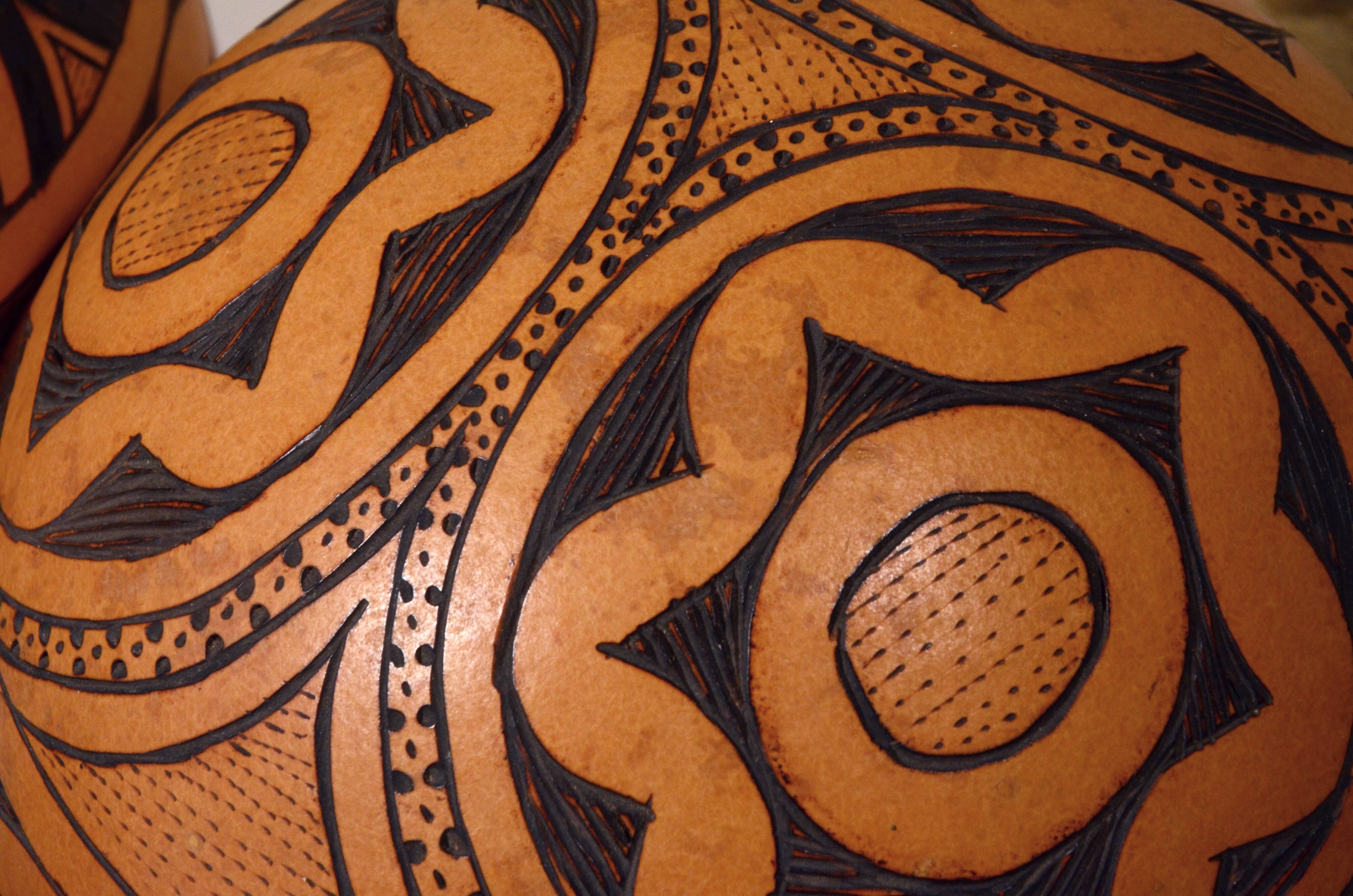 2 half decorated gourds (pyrography), floral and geometric patterns, 20cm